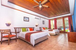 Voodi või voodid majutusasutuse Nandel Beach Resort toas