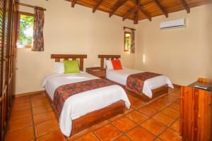Voodi või voodid majutusasutuse Nandel Beach Resort toas