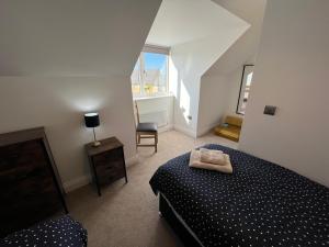 Postel nebo postele na pokoji v ubytování DAIRY COTTAGE WHITBY