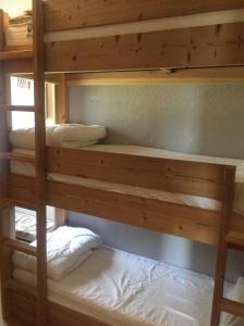 Posteľ alebo postele v izbe v ubytovaní Cocoonabay Appartements 8