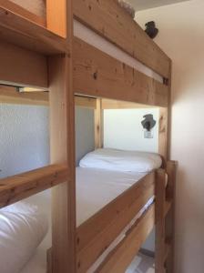 Posteľ alebo postele v izbe v ubytovaní Cocoonabay Appartements 8