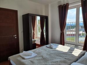 Katil atau katil-katil dalam bilik di Apartmán s wellness