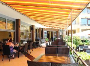 A restaurant or other place to eat at Hotel Iris