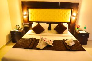 Voodi või voodid majutusasutuse SS Silver Oaks Resort toas