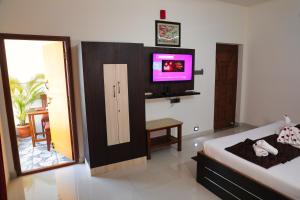 Voodi või voodid majutusasutuse SS Silver Oaks Resort toas