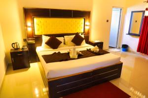 Voodi või voodid majutusasutuse SS Silver Oaks Resort toas