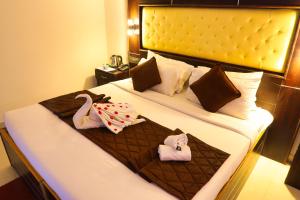 Voodi või voodid majutusasutuse SS Silver Oaks Resort toas