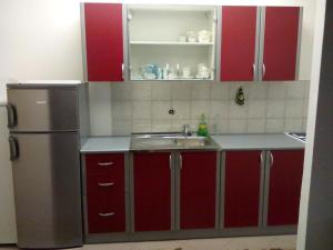 Kuchyňa alebo kuchynka v ubytovaní Quadruple Room Pag 11487b + 10 fotografií