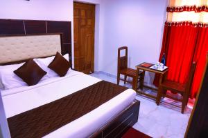 Voodi või voodid majutusasutuse SS Silver Oaks Resort toas
