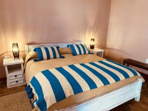 Posteľ alebo postele v izbe v ubytovaní Hostal Katari