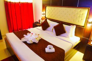 Voodi või voodid majutusasutuse SS Silver Oaks Resort toas