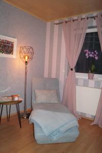 Afbeelding uit fotogalerij van Ferienwohnung Orchidee Eckenhagen in Reichshof  +8 foto's