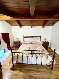 Ένα ή περισσότερα κρεβάτια σε δωμάτιο στο Il Giardino di Athena 1