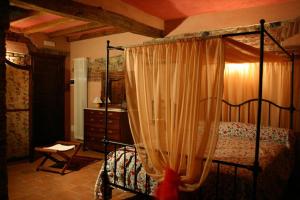 Ein Bett oder Betten in einem Zimmer der Unterkunft La Via'