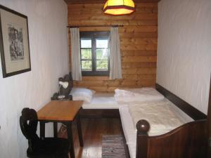 Posteľ alebo postele v izbe v ubytovaní Schiappartement Nassfeld + 13 fotografií