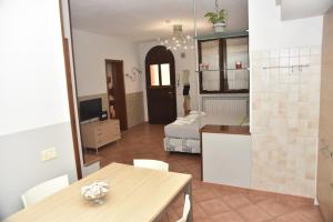 A bed or beds in a room at Casa Emanuela, Il nostro Nido d'amore