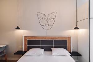 Postel nebo postele na pokoji v ubytování Wine Rock Hotel