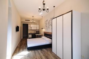 Postel nebo postele na pokoji v ubytování Wine Rock Hotel