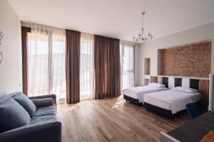 Postel nebo postele na pokoji v ubytování Wine Rock Hotel
