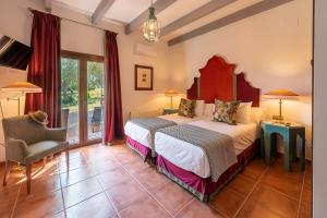 Posteľ alebo postele v izbe v ubytovaní La Casa del Torero