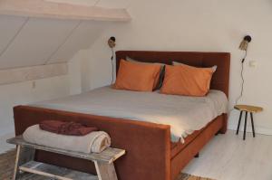 Postel nebo postele na pokoji v ubytování B&B Sonnehuys