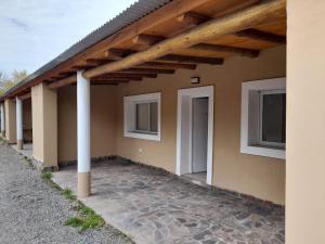 a view of a house with a wooden roof at Olivares de Krishna in San Fernando del Valle de Catamarca +1 photo