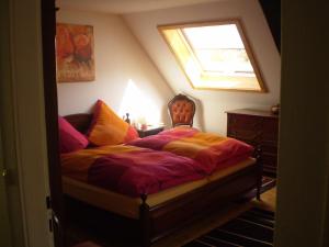 Postel nebo postele na pokoji v ubytování Grundhäusle