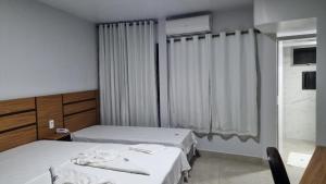 Postel nebo postele na pokoji v ubytování ARARAS Apart Hotel - CTC