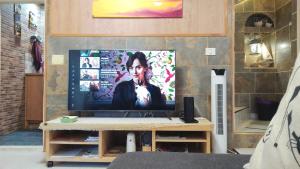 a television sitting on a table in a room at Cliff House Gran Canaria in Gáldar
