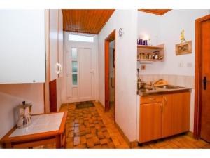 Kuchyň nebo kuchyňský kout v ubytování Apartment Krk 11646a