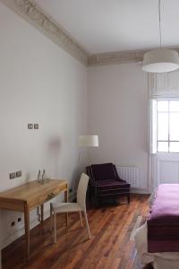 Rúm í herbergi á Matildas Hotel Boutique