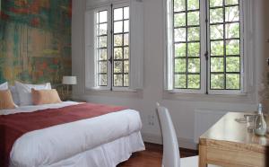 Rúm í herbergi á Matildas Hotel Boutique