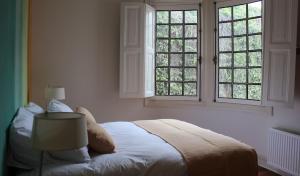 Rúm í herbergi á Matildas Hotel Boutique