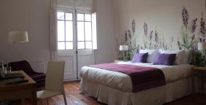 Rúm í herbergi á Matildas Hotel Boutique