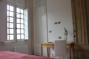 Rúm í herbergi á Matildas Hotel Boutique