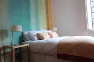 Rúm í herbergi á Matildas Hotel Boutique