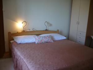 Posteľ alebo postele v izbe v ubytovaní Apartments by the sea Umag - 11647