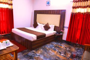 Voodi või voodid majutusasutuse SS Silver Oaks Resort toas