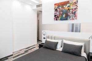 Postel nebo postele na pokoji v ubytování Palazzo IrMa - Hotel - B&B Luxury