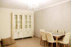 a dining room with a table and chairs at Dilijan is for U in Dilijan +9 photos