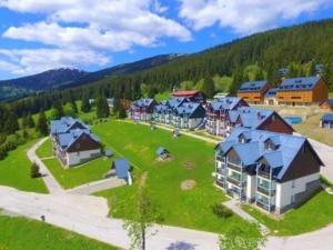 an aerial view of a resort in the mountains at Apartmán Horní Mísečky in Vítkovice