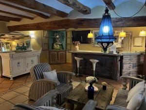 Posezení v ubytování Les Vinyes Alojamiento Rural Boutique & SPA