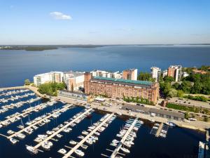 an aerial view of a marina with boats docked at Upea loftsuite, järvinäkymä, wifi, sauna & spa in Tampere