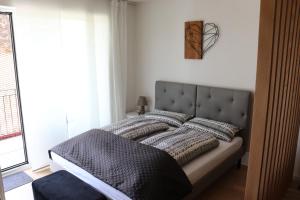 Postel nebo postele na pokoji v ubytování Luxus Apartment in Burghausen