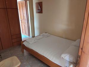 A bed or beds in a room at Stone House