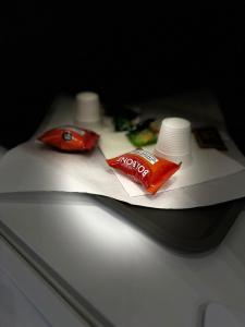 a counter top with two packets of toothpaste and tooth paste at One Hundred Rooms in Rome