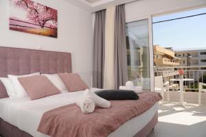Postel nebo postele na pokoji v ubytování Holiday Home in a great location! Welcome to Crete!