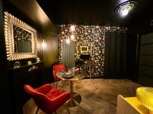 Posedenie v ubytovaní Love Room Secrète Les Petits Plaisirs