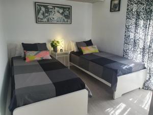 Postel nebo postele na pokoji v ubytování NOOL Sevilla