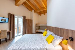 A bed or beds in a room at B & B Il Sottobosco